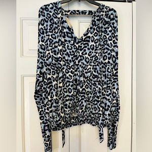 Women’s Michael Kors long sleeve blouse.